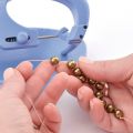 Outil pour faire des noeuds de table Knot a bead
