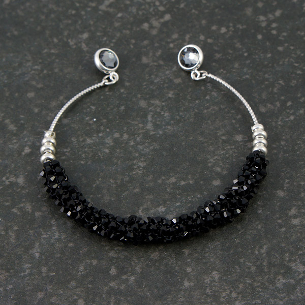 Bracelet jonc toupies Swarovski tissage peyote tubulaire