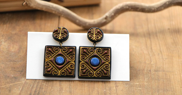 Boucles d'oreilles en polymère liquide