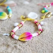 Coquillage Cauri dégradé rose/jaune - effet tie and dye - 20 à 26mm x1