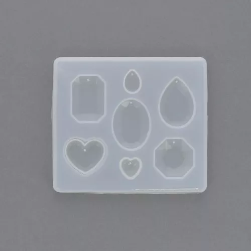 Moule silicone pour réaliser des pendentifs et breloques en résine x1