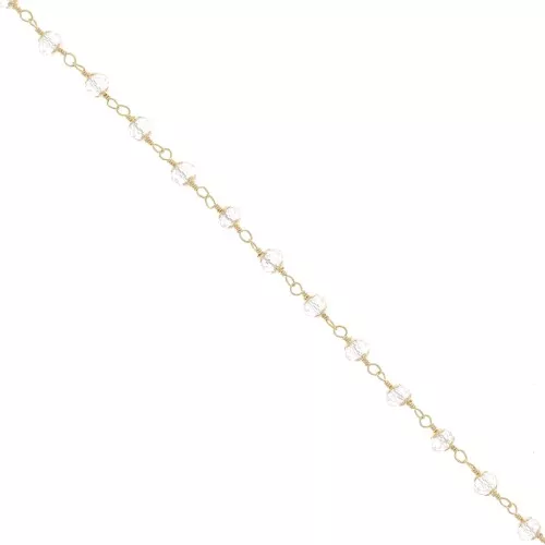 Chaîne perlée de perles facettées en verre 6 mm Doré / Transparent x50cm