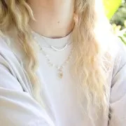 Chaîne perlée de perles facettées en verre 6 mm Doré / Transparent x50cm