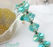 Perles en verre Kos® par Puca® 6x3 mm - Opaque Green Turquoise New Picasso x10g