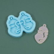 Moule silicone - boucles d'oreilles visage pour résine époxy et poudre céramique|raw }}