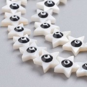 Perle étoile en nacre 11x12 mm motif oeil Noir x1