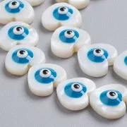 Perle coeur en nacre 12x13 mm motif oeil Bleu x1