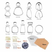 Set de 18 emporte-pièces acier inox avec accessoires et boucles d'oreilles