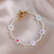 Perle fleur 12 mm en nacre - Blanc - Bleu x1