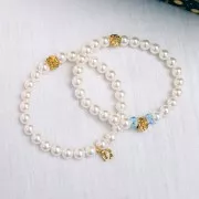 Breloque fleur ajourée 7 mm avec cabochon imitation nacre Acier inoxydable 304L x1