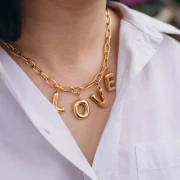 Pendentif lettre alphabet ballon 23x14 mm - K - Acier inoxydable 304L Doré x1