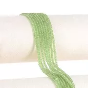 Perles rondelles aplaties facettées 3x2 mm en pierre gemme - Peridot x39cm