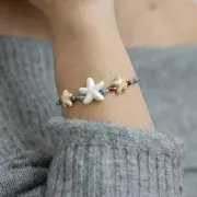 Perles étoile de mer 12x11 mm en céramique - Jaune irisé x5