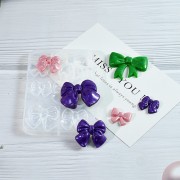 Moule silicone pour réaliser des noeuds papillons x1|raw }}