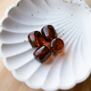 Perles tubes 16x14 mm en résine translucide - Ambre marbré x4