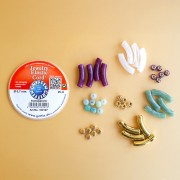 Mes bijoux DIY - Kit de 4 bracelets élastiques avec perles tubes - Version Doré