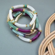 Mes bijoux DIY - Kit de 4 bracelets élastiques avec perles tubes - Version Doré