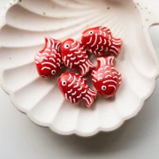 Perle poisson 27x20 mm en céramique - Rouge - Blanc x1