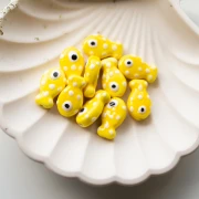 Perle poisson à pois 19x11.5 mm en céramique - Jaune - Blanc x1