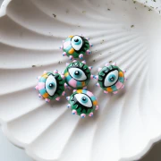 Perle ronde aplatie 17 mm en verre - motif oeil - Rose - Bleu clair - Vert x1