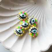 Perle ronde aplatie 17 mm en verre - motif oeil - Jaune - Vert - Rose bonbon x1