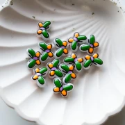Perle en verre papillon 14x10 mm en verre - Vert - Orange - Lilas x1
