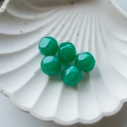 Perle ronde irrégulière facettée 14 mm résine transparente - Jade x1