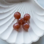 Perle ronde irrégulière facettée 14 mm résine transparente - Marron x1