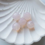 Perles rondes irrégulières facettées 14 mm en résine transparente - Rose pâle