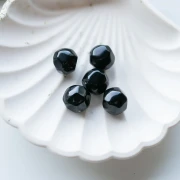 Perles rondes irrégulières facettées en résine 16 mm Noir x1