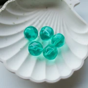 Perles rondes irrégulières facettées en résine 16 mm Aqua transparent x1