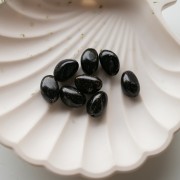Perles nuggets irréguliers 13.5x9 mm en résine opaque - Noir pailleté doré x8