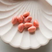 Perles nuggets irréguliers 13.5x9 mm en résine opaque - Corail marbré x8