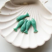 Intercalaire poisson 27x9 mm en résine - Vert turquoise x1