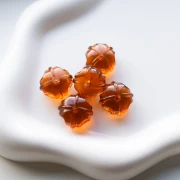 Perles rondelles travaillés 18 mm en résine transparente - Topaz x1