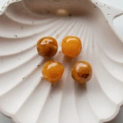 Perles rondes irrégulières 15 mm en résine translucide - Abricot marbré x4