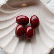 Perle olive 21x15 mm en résine opaque - Bordeaux x1