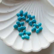 Perle fleur irrégulière en verre opaque 18x17 mm - Bleu Turquoise x1