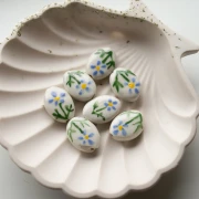 Perle ovale 19x14.5 mm en céramique - motif fleur - Blanc - Bleu - Vert x1
