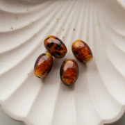 Perles ovale 16x11 mm en verre - Marbré Marron - Pailleté x4