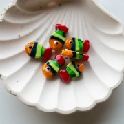 Perle poisson 21x13 mm en verre - Rayé - Orange - Vert - Rouge x1