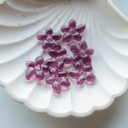Perle fleur irrégulière 18x17 mm en verre translucide - Prune x1