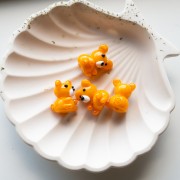 Perle ourson 19x14 mm en verre - Orange marbré x1