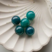 Perles rondes 15.5 mm en acrylique translucide - Bleu paon marbré x5