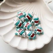 Perle poisson 18x21 mm en céramique - Blanc - Turquoise x1