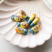 Perle poisson 21x11 mm en céramique - Jaune - Orange - Bleu x1