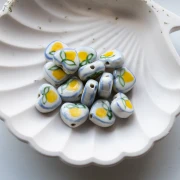 Perle coeur 12x14 mm en céramique - motif citron - Blanc - Jaune x1