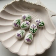 Perle ovale 19x14.5 mm en céramique - motif fleur - Blanc - Violet - Vert x1