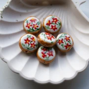 Perle ronde aplatie 20 mm en céramique - motif fleurs - Blanc - Rouge x1