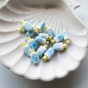 Perle glace 15x8 mm en céramique - Bleu - Blanc x1